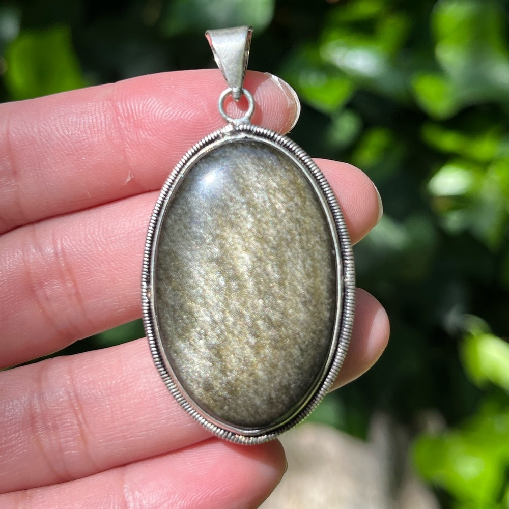 Silver plated gold flashy‎ obsidian pendant